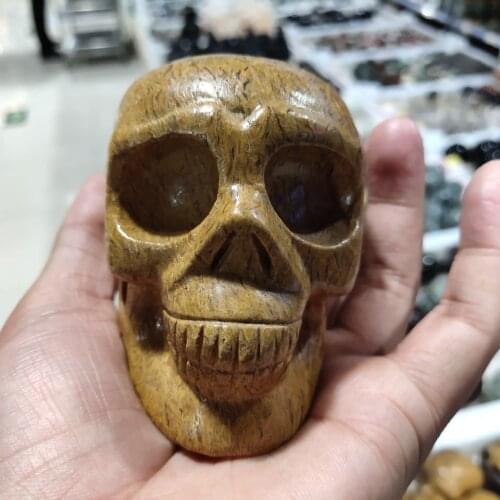 Natural gold silk jade stone skull crystal skull carved ornaments