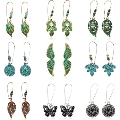 Vintage Bronze Leaf Flower Series Earrings Hollow Maple Leaf Wreath Carved Wooden Beaded Rhinestone Wing Charm Bohemian Earrings