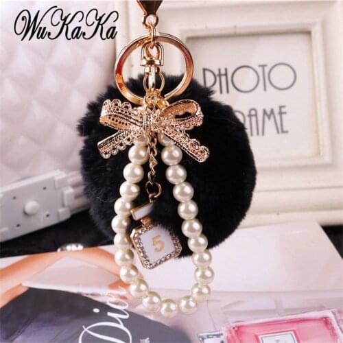 2020 Fashion Pearl Chain Crystal Bottle Bow Pompom Keychain Car Women handBag Key Chain Ring Fluffy Puff Ball Keychains Jewelry