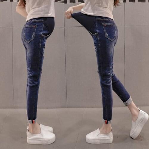 Pregnant women jeans spring 2019 new tide mother stomach lift pants nine pants pants stretch feet pants wear