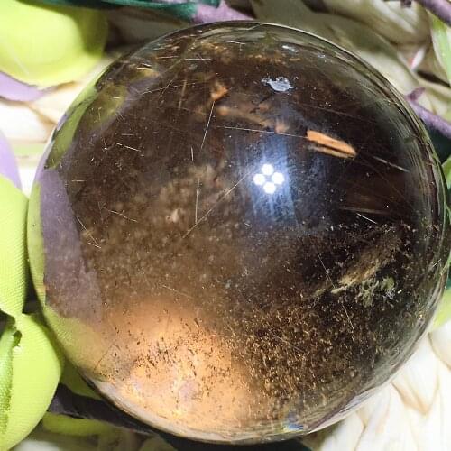 Smoky quartz rutilated quartz sphere