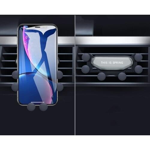 Car air outlet decoration A gravity car phone holder Creative multi-function mini lazy navigation clip
