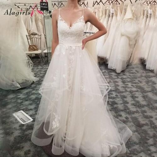 Luxury appliques v-neck wedding dresses Sexy spaghetti straps tiered robes for bride Simple vestidos de noiva plus size 2020