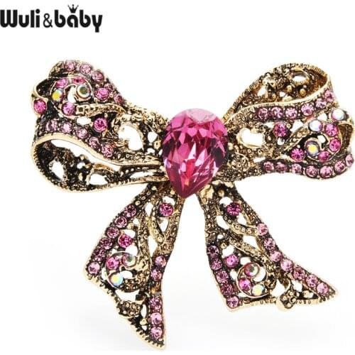 Wuli&baby 2021 New Sparkling Crystal Bow Knot Brooch Pins 4 Colors Winter Women Jewelry Badge Gift