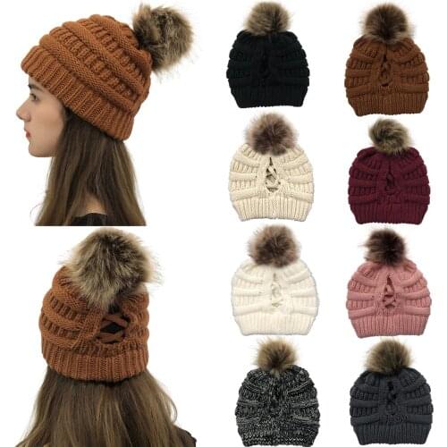 New style ladies beanie ponytail solid color winter ball cap and ball plush hat stitching autumn hat crochet cross beanie