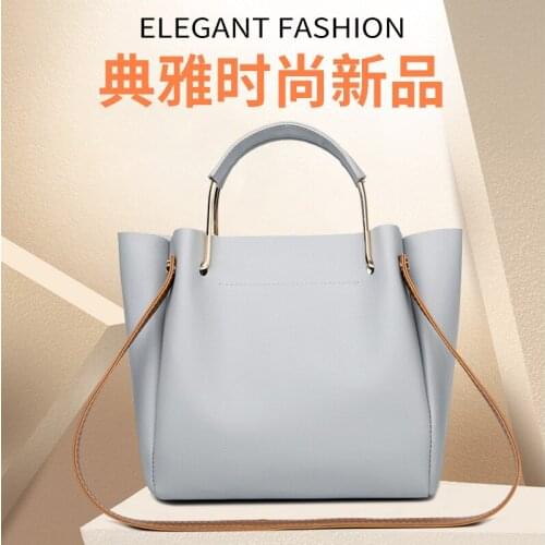 Bag girl 2021 summer new Korean version of solid womens handbag metal handle casual one-shoulder bag womens bag