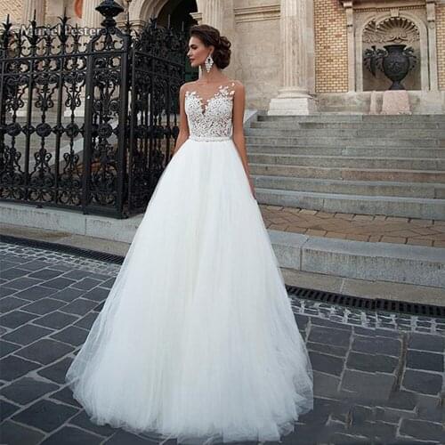 Skin Tulle Ivory Lace Appliques Beach Wedding Dress With Sashes Cap Sleeves Pirncess Bridal Gown Custom Made Robe De Marriage