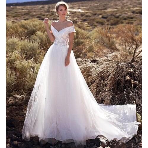 Boho Wedding Dress A-Line V-Neck Off Shoulder Lace Appliques Sequined Criss-Cross Backless Floor Length Sweep Train Bride Gown