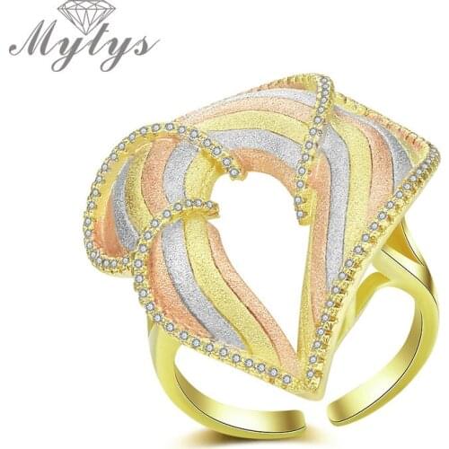 Mytys Hollow Leaf Flower Shape Three Tone Gold Ring For Women High Quality Sand Blast Technology Jewelry Fashion Accessory R2060