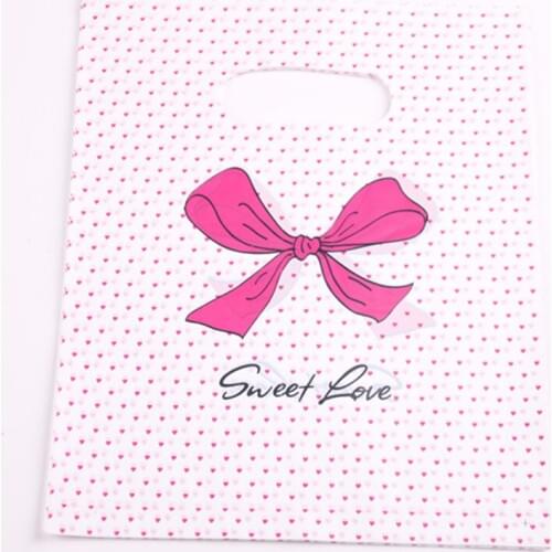New Design Wholesale 100pcs/lot 20*25cm Pink Sweet Love Packaging Bags For T-shirt Plastic Shopping Bags With Dot Bow