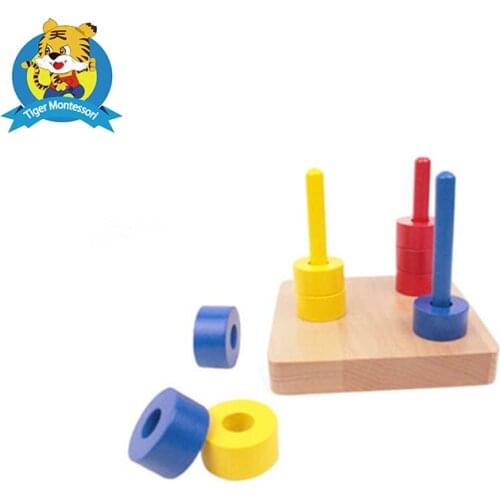 Montessori Discs on Vertical Dowel toy