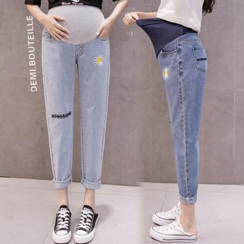 Maternity trousers jeans Xia Xiaohua chrysanthemum loose hole high waist was thin daddy nine points turnip