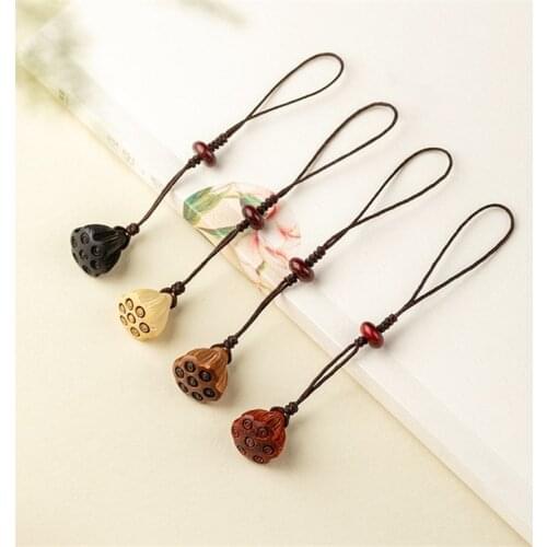 Ebony hand-carved lotus car keychain key pendant to ward off evil and protect the peace and security of Bodhi root