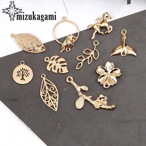 10pcs/lot Zinc Alloy Charms Gold Hollow Leaves Fish Tail Horse Flowers Charms Pendant For DIY Jewelry Making Accessories