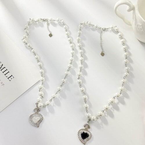 Pearl ornaments, European and American fashion, exaggerated splicing, womens hearts and gems pendant necklace