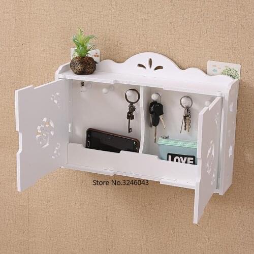 Simple and modern wall shelves hook-free drilling living room decorative wall hanging key storage box finishing box