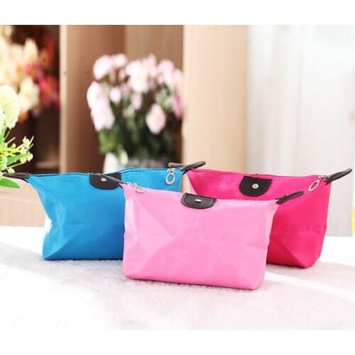 Handbag style travel wash Storage bag Dumpling cosmetic Foldable nylon Pure color Contracted present Portable and practical bag