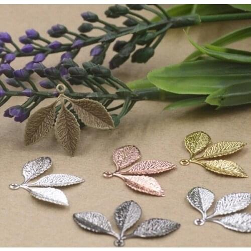 31*23mm beads for Jewelry DIY bracelet necklace earring Brooches Pendants Scrapbook rivet hair Accessories three leafnew wh