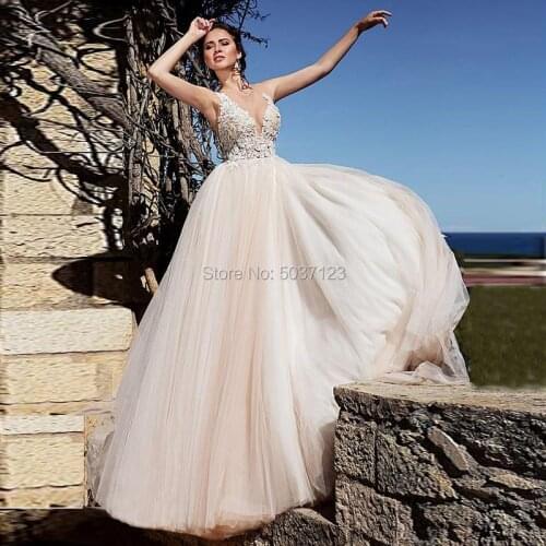 Sexy Sheer Top Illusion V Neckline Nude Tulle Wedding Dresses Champagne Off Shoulder Lace Appliques Floor Length Bridal Gowns