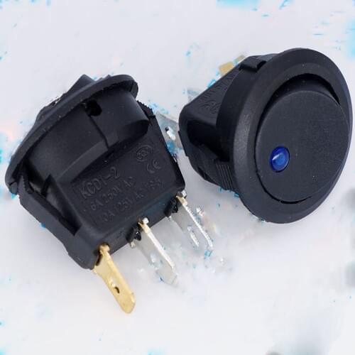 Blue light The cats eye ship type switch KCD1-2 on the cats eye circle below Blue 12 v power supply switch
