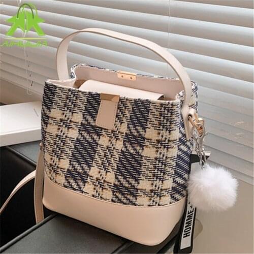 Fashion Striped Woven Bucket Bags 2021 New Trend Ladies Tassel Shoulder Bags Shopping Handbags PU Casual Female Messenger Bags