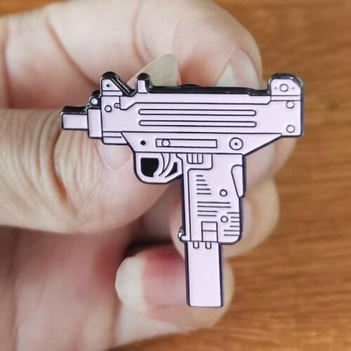 Pink uzi gun badge