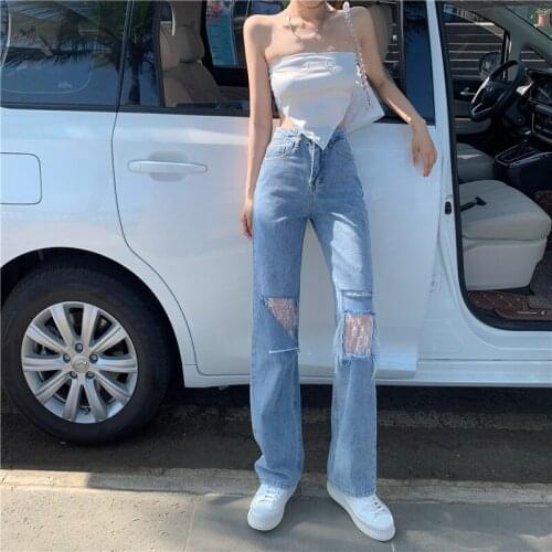 Spot Chinese new womens pants personality fashion street mesh stitching high waist broken jeans