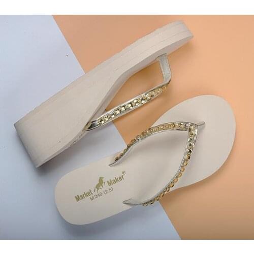 2019 simple high-heeled flip-flops womens summer non-slip slope with thick bottom beach sandals and slippers muffin Han trend