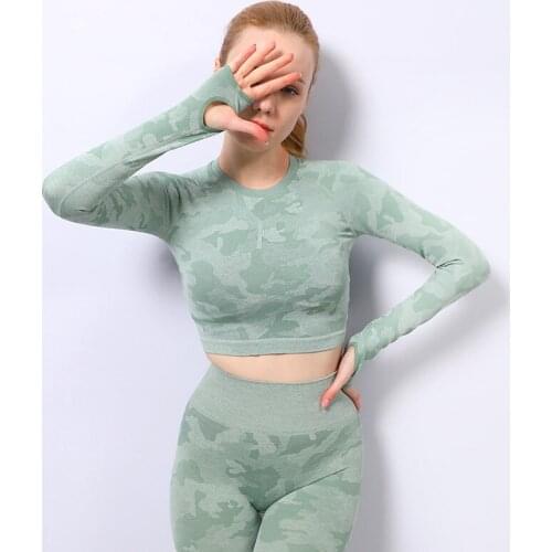 Seamless yoga wear oversized suit high stretch knitted hollow quick-drying long-sleeved fitness yoga two-piece suit women