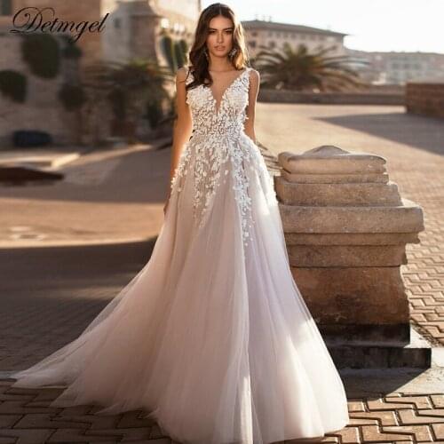 Detmgel New Sexy V-neck Backless Beaded Bride A-Line Wedding Dresses 2021 Gorgeous Appliques Court Train Princess Bridal Gown