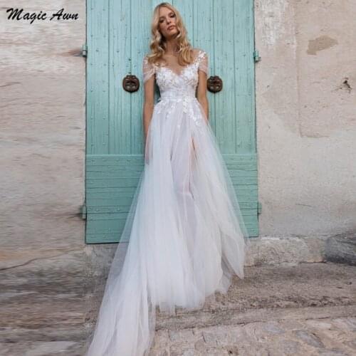 Magic Awn New Beach Wedding Dresses Lace Appliques Side Split Open Back Boho Wedding Party Gowns Cap Sleeves A-Line Robes Mariee
