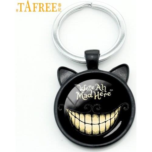 TAFREE We Are All Mad Here keychain Evil smile Quote key chain Car key-holder men women round dome glass cabochon jewelry CN702