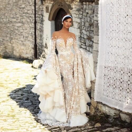 2021 Newest Champagne Floral Mermaid Wedding Dresses With Long Flare Sleeves See Thru Deep V Neck Lace Tulle Bridal Gowns