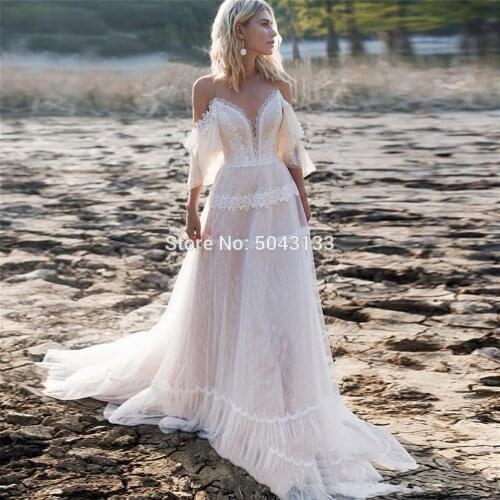 2021 Bohemian Wedding Dresses Off Shoulder A Line Spaghetti Straps Lace Applique Wedding Gowns Backless Beach Bridal Dress