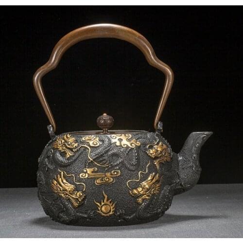 Creative household Jiulong gilded cast iron teapot uncoated Kung Fu Tea Towel iron pot boiling water bubble teapot