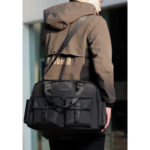 The new popular logo one-shoulder sloping cross-bag mens multi-functional handbag fashion casual briefcase