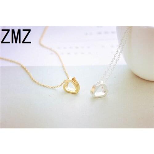 ZMZ 50pcs/lot 2018 Europe/US fashion hollow heart shape pendant cute romantic jewelry Valentines girlfriend gift party jewelry