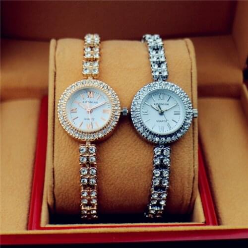 Fashion Sivler Bracelet Ladies Watch Crystal Diamond Watchband Wrist Watches KINNUOS Luxury Rome Date Quartz Clock Female Hours