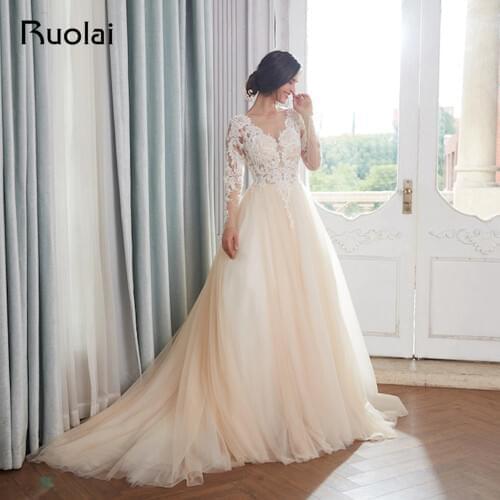 Champagne Wedding Dresses 2020 Dubai Long Sleeves Arabic Pearls Beaded Ball Gown Wedding Gown Dress Elegant Robe de Mariee RW15