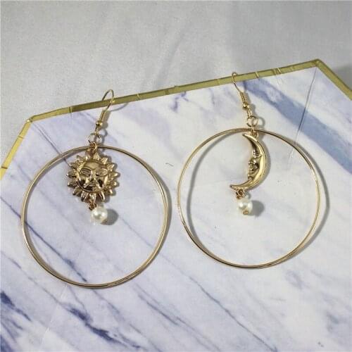 European and American exaggerated temperament sun moon pearl earrings retro personality atmosphere cold wind earrings without ho