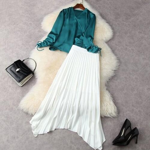 European and American womens wear for spring 2021 Long sleeved green v-neck shirt Pleated irregular skirt Fashion suits