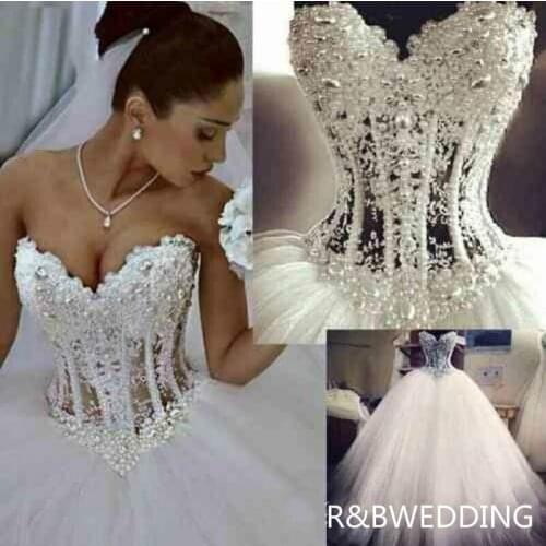 2020 Ball Gown Wedding Dresses Sweetheart Corset See Through Floor Length Princess Bridal Gowns Beaded Lace Pearls Custom Made