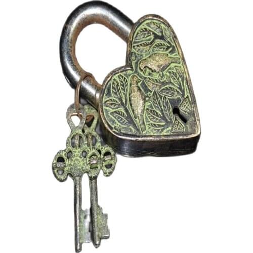 Early collection of Nepalese bronze double bird heart-shaped locks