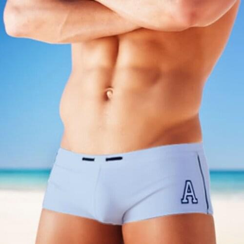 Mens short swimming trunks Beach Shorts Quick-drying trendy beach pants Sexy trendy new pants surf Leisure Solid color
