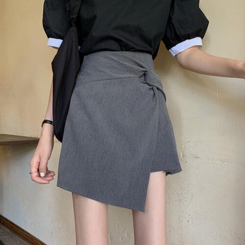 Spring half-length skirt women 2021 new Korean version of thin pleated skirt irregular knotted high waist A-line skirt