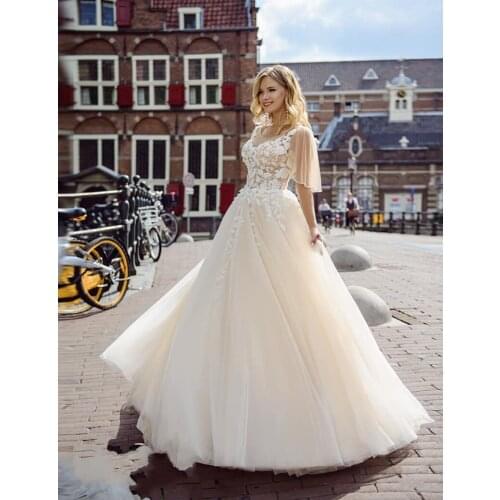 Ruby Bridal Princess 2020 New Wedding Dresses Champagne Tulle Appliques Beaded Bridal Gown Illusion свадебное платье Plus Size