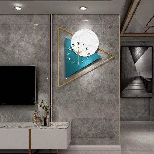 Fashion light luxury clock modern minimalist creative wall clock home decoration art clock mute wall clock 57X52CM