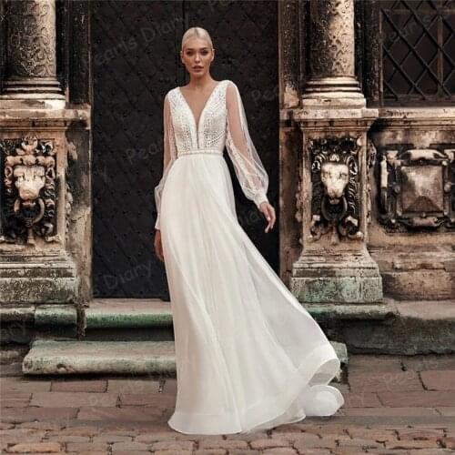 Charming A Line Tulle Wedding Dresses Robe De Mariage 2021 Beach Long Sleeves Bride Delicate Lace Applique Backless Bridal Gowns