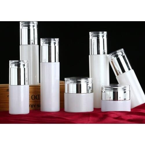 50pcs New pearl white cosmetic glass Essence lotion bottle set skin care cream jar silver lid 20ml 30ml 40ml 50ml 60ml 80ml