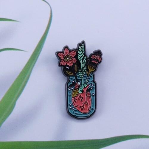 Badge Brooch Pin of anatomical human heart in Vase